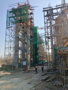 High-rise scaffolding erected for the construction of vertical lift structures.