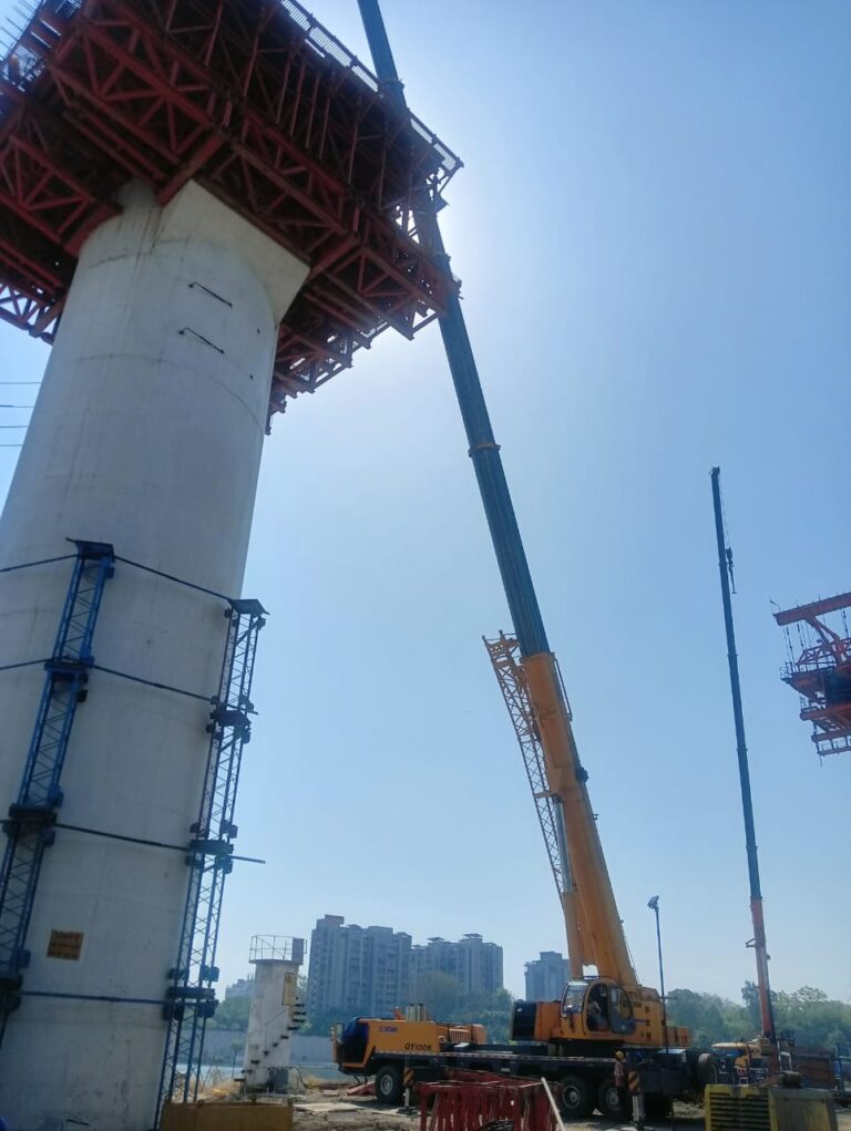 "Central India’s largest crane rental company at riverfront bridge construction project"